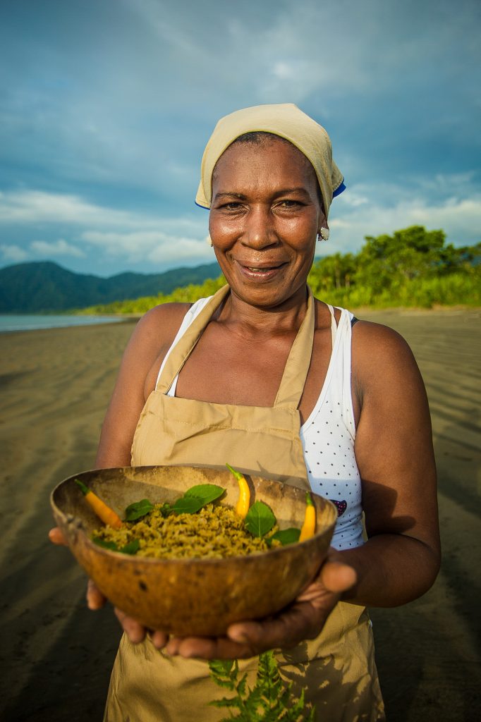 Pacific Forest Communities - Produce A woman with produce in the Pacific Forest Communities, Colombia.
